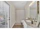 Small bathroom with shower/tub combo and granite vanity at 11016 Orangeshire Ct, Ocoee, FL 34761