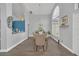 Bright dining room features a chandelier and large window at 11016 Orangeshire Ct, Ocoee, FL 34761