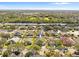 Wide aerial view of the neighborhood with the subject property marked at 11016 Orangeshire Ct, Ocoee, FL 34761