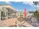 Relaxing patio with seating area and a pergola at 11016 Orangeshire Ct, Ocoee, FL 34761