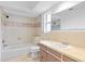 Bathroom with tub and shower combination, sink, and toilet at 116 Sheridan Ave, Longwood, FL 32750