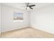 Bright bedroom with ceiling fan and neutral carpeting at 116 Sheridan Ave, Longwood, FL 32750