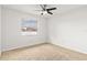 Bright bedroom with carpeted floor, ceiling fan, and window with blinds at 116 Sheridan Ave, Longwood, FL 32750