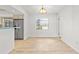 Dining room with tile floors and a chandelier at 116 Sheridan Ave, Longwood, FL 32750