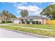 Ranch home with attached garage and landscaped lawn at 116 Sheridan Ave, Longwood, FL 32750