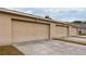 Attached garage with three parking spaces at 12557 Langstaff Dr, Windermere, FL 34786