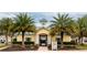 Community pool house with palm trees at 12557 Langstaff Dr, Windermere, FL 34786