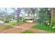 Small house with front yard and mature trees at 1303 Stowe Ave, Mount Dora, FL 32757