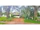 Quaint one-story house with a covered porch at 1303 Stowe Ave, Mount Dora, FL 32757