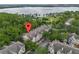 Condo building situated near a lake and green space at 13103 Mulberry Park Dr # 811, Orlando, FL 32821