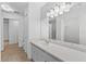 Clean bathroom with vanity, mirror and toilet at 13103 Mulberry Park Dr # 811, Orlando, FL 32821