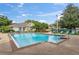 Inviting community pool with plenty of lounge chairs at 13103 Mulberry Park Dr # 811, Orlando, FL 32821