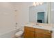 Clean bathroom with a bathtub and a modern vanity at 1440 Waterview Ridge Cir, Apopka, FL 32703