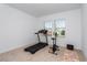 Spacious bedroom with treadmill and exercise bike at 1440 Waterview Ridge Cir, Apopka, FL 32703