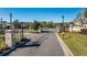 Gated community entrance with landscaping and signage at 1440 Waterview Ridge Cir, Apopka, FL 32703