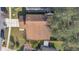 Aerial view of house roof and surrounding landscape at 1448 Brook Hollow Dr, Orlando, FL 32824