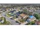 Aerial view of house and neighborhood, showcasing surrounding homes and landscape at 1448 Brook Hollow Dr, Orlando, FL 32824