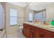 Bathroom with double vanity and bathtub at 1448 Brook Hollow Dr, Orlando, FL 32824