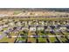 Aerial view of neighborhood with focus on a house and backyard at 165 Williamson Dr, Davenport, FL 33897