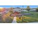 Community playground with shade structure and play equipment at 165 Williamson Dr, Davenport, FL 33897