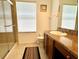 Clean bathroom with shower, toilet and granite countertop at 1708 Clubhouse Cv, Haines City, FL 33844