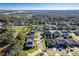 Aerial view of a residential neighborhood with lake views at 1713 Fullers Oak Loop, Winter Garden, FL 34787