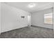 Simple bedroom with grey carpet and closet at 1713 Fullers Oak Loop, Winter Garden, FL 34787