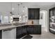 Modern kitchen featuring stainless steel appliances and granite countertops at 1713 Fullers Oak Loop, Winter Garden, FL 34787