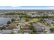 Aerial view showing home's location in a residential neighborhood near a lake at 1820 Putney Cir, Orlando, FL 32837