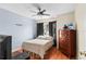 Bright bedroom with wood flooring and ceiling fan at 1820 Putney Cir, Orlando, FL 32837