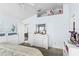 Main bedroom with white dresser, mirror and king-size bed at 1820 Putney Cir, Orlando, FL 32837