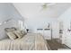 Spacious main bedroom with white dresser and king-size bed at 1820 Putney Cir, Orlando, FL 32837