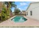 Inviting kidney-shaped pool, perfect for relaxation at 1820 Putney Cir, Orlando, FL 32837