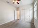 Bedroom with double closet and access to bathroom at 1870 Dumbleton Pl, St Cloud, FL 34771