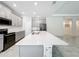 Modern kitchen with gray cabinets, white countertop, and island at 1870 Dumbleton Pl, St Cloud, FL 34771