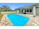 Relaxing rectangular pool with stone deck at 1870 Dumbleton Pl, St Cloud, FL 34771