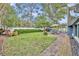 Spacious backyard with patio, lawn, and shed at 1871 Linden Rd, Winter Park, FL 32792