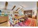 Spacious dining room with a rustic wooden table and fireplace at 1871 Linden Rd, Winter Park, FL 32792