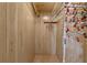 Large walk in closet with hanging rods and shelving at 2010 Brookside Dr, Mount Dora, FL 32757