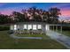 Single-story home with carport and well-maintained lawn at 2010 Brookside Dr, Mount Dora, FL 32757