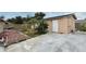 Large backyard with concrete patio and shed at 2090 Ashland Blvd, Orlando, FL 32808