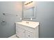 Clean bathroom with vanity, mirror and towel rack at 2090 Ashland Blvd, Orlando, FL 32808