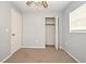 Spacious bedroom with neutral walls, ceiling fan and carpet flooring at 2090 Ashland Blvd, Orlando, FL 32808