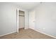 Small bedroom closet with louvered doors and shelving at 2090 Ashland Blvd, Orlando, FL 32808