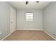 Bright bedroom with neutral walls, ceiling fan and carpet flooring at 2090 Ashland Blvd, Orlando, FL 32808