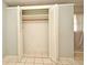 White closet with bi-fold doors, shelf, and rod at 2090 Ashland Blvd, Orlando, FL 32808