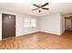 Bright living room with hardwood floors and ceiling fan at 2090 Ashland Blvd, Orlando, FL 32808