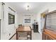 Bright dining room with a wood table and built-in cabinetry at 2100 Suffield Dr, Winter Park, FL 32792