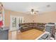 Relaxing Gathering room with a sectional sofa and wood floors at 2100 Suffield Dr, Winter Park, FL 32792