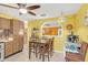 Kitchen with breakfast nook and view into living area at 2100 Suffield Dr, Winter Park, FL 32792